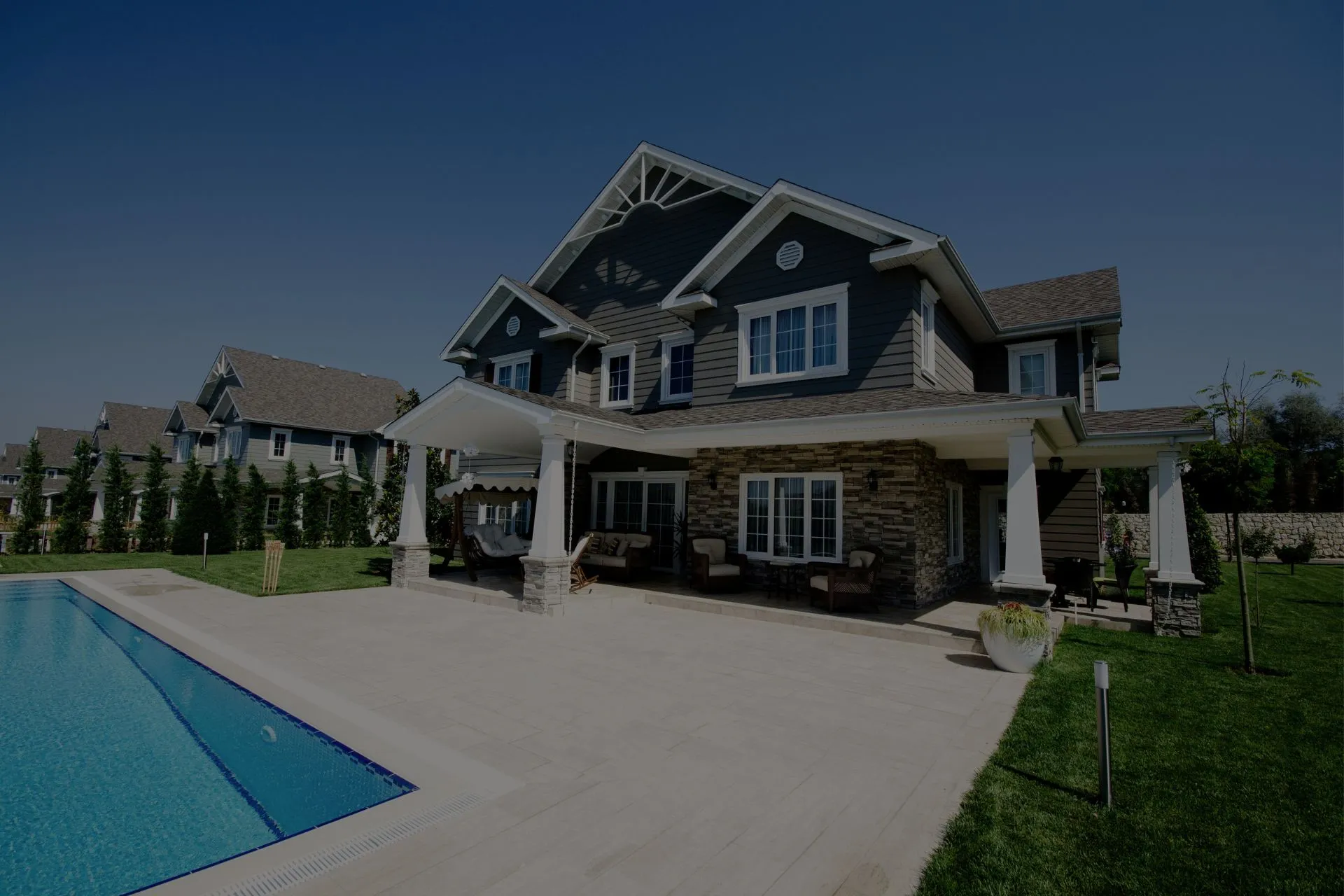 A spacious two-story family home with a backyard pool